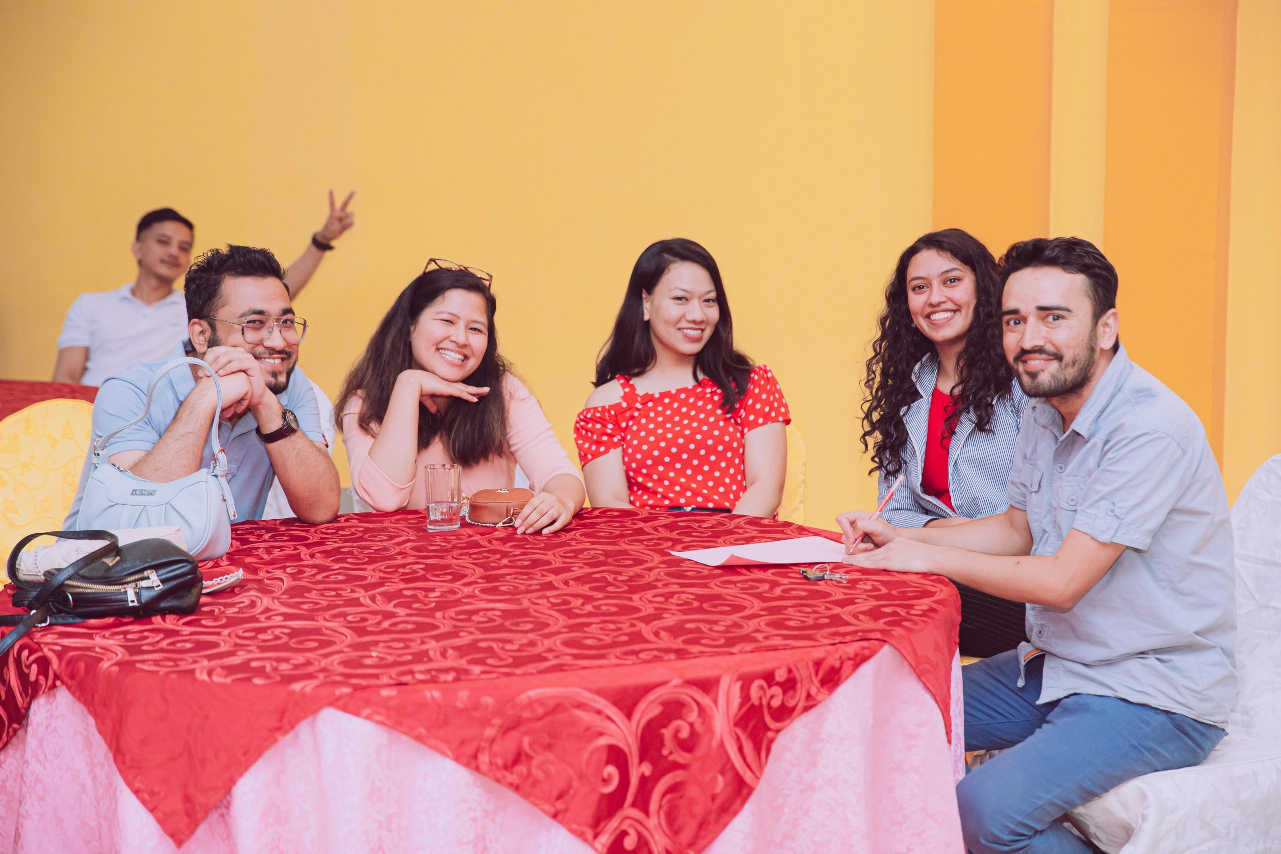 group of friends posing camera 